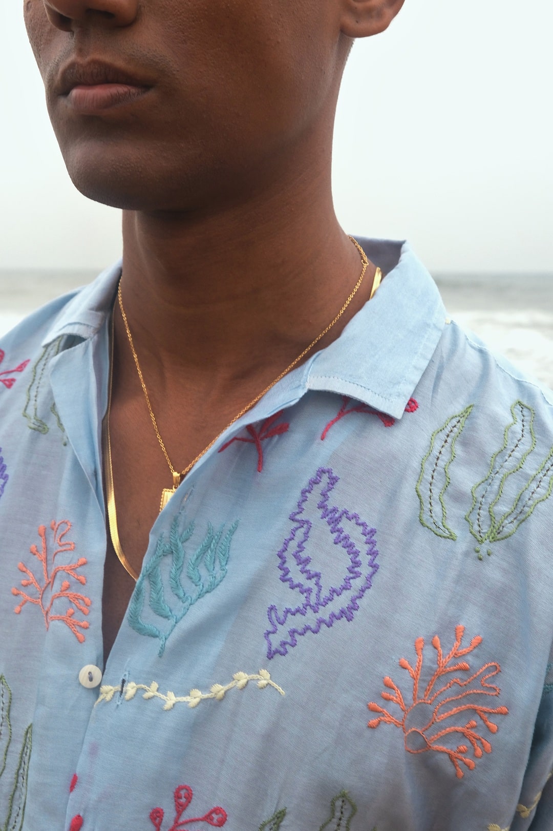 Close-up of detailed chikankari embroidery on the Coraline Shirt.