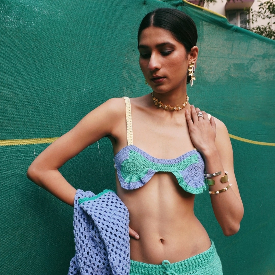 Front view of Shell crochet bralette in a vibrant color block design.