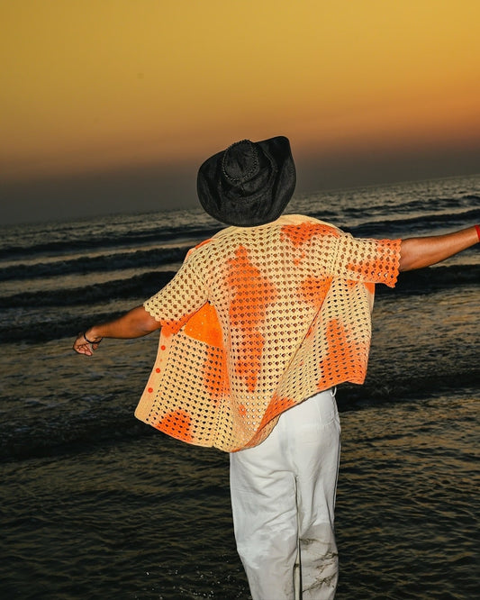 Back view of the Sundaze Crochet Shirt, featuring a relaxed silhouette with a sun-faded finish.