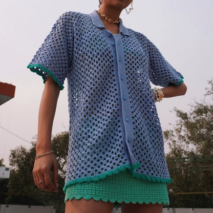 Retro-inspired open-stitched Peekaboo Crochet Shirt with elbow-length sleeves and a relaxed fit, handmade with 100% cotton yarn.